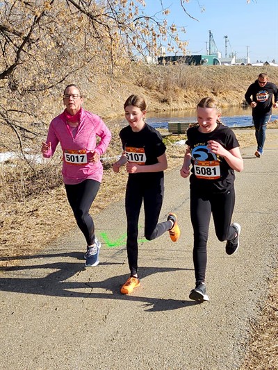 People running along the path