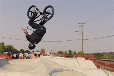 A person doing a flip on their bike